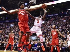 Raptors centre Lucas Nogueira stops Chicago Bulls guard Kay Felder during second half NBA action at the Air Canada Centre in Toronto on Tuesday night.