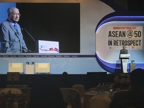 Former Malaysian Prime Minister Mahathir Mohamad speaks at the ASEAN@50 in Retrospect, a regional Southeast Asia forum, Thursday, Nov. 16, 2017, in Bangkok, Thailand. Mahathir, who led Malaysia through the final two decades of the 20th century and has waded back into its politics in recent months said Thursday the country's current government is deeply problematic and "must go." (AP Photo/Ted Anthony)