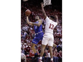 Duke guard Gary Trent Jr (2) shoots over Indiana forward Juwan Morgan (13) during the first half of an NCAA college basketball game, Wednesday, Nov. 29, 2017, in Bloomington, Ind. (AP Photo/Darron Cummings)