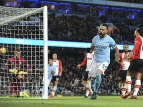 Manchester City's Nicolas Otamendi celebrates after scoring during the English Premier League soccer match between Manchester City and Southampton at Etihad stadium, in Manchester, England, Wednesday, Nov. 29, 2017. (AP Photo/Rui Vieira)