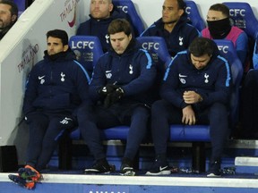 Tottenham manager Mauricio Pochettino, centre, during the English Premier League soccer match between Leicester City and Tottenham Hotspur at the King Power Stadium in Leicester, England, Tuesday, Nov. 28, 2017. (AP Photo/Rui Vieira)