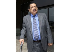 FILE - In this Aug. 22, 2013, file photo, former El Salvadoran military Col. Inocente Orlando Montano departs federal court in Boston. Spanish authorities said Montano was extradited to Spain on Wednesday, Nov. 29, 2017, to face charges that he helped plot the 1989 massacre of six Jesuit priests and two others in El Salvador. (AP Photo/Steven Senne, File)