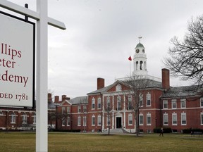 FILE - This April 11, 2016 photo shows a portion of the prestigious Phillips Exeter Academy campus in Exeter, N.H. Police recommended two deans from the prep school be arrested on misdemeanor charges for failing to properly report allegations that a male student groped a female classmate. A state police report from November 2016, obtained by the Associated Press, showed that arrest warrants had been prepared for Phillips Exeter Academy's Arthur J. Cosgrove and Melissa D. Mischke. (AP Photo/Jim Cole, File)