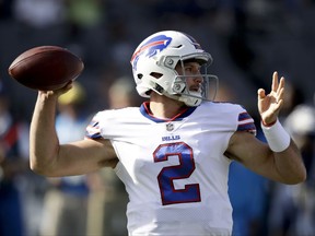 Buffalo Bills quarterback Nathan Peterman warms up before an NFL football game against the Los Angeles Chargers, Sunday, Nov. 19, 2017, in Carson, Calif. (AP Photo/Jae C. Hong)