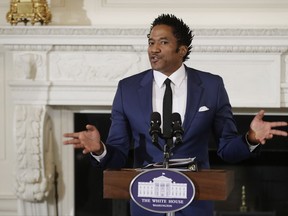 FILE - In this Sept. 8, 2016 file photo, Kennedy Center's Artistic Director for Hip-Hop Culture, Q-Tip, reads a poetry, during the National Student Poets event, in the State Dining Room of the White House in Washington. Q-Tip of A Tribe Called Quest is blasting the Grammys in an angry video for failing to recognize the band's final album with a nomination. The rapper-producer tells off the organization and calls it "corny" in an expletive-filled rant posted Tuesday, Nov. 28, 2017, on Instagram. (AP Photo/Manuel Balce Ceneta, File)
