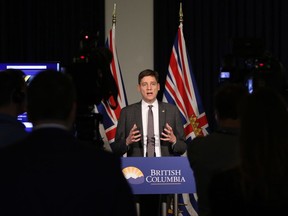 Attorney General David Eby speaks to media following the public engagement launch for next year's provincial referendum on electoral reform during a press conference at Legislature in Victoria, B.C., on Thursday, November 23, 2017. THE CANADIAN PRESS/Chad Hipolito