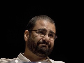 FILE - In this Sept. 22, 2014 file photo, Alaa Abdel-Fattah, an iconic figure of the Egypt's pro-democracy movement, attends a conference at the American University in Cairo, Egypt. On Wednesday, Nov. 8, 2017, Egypt's highest appeals court upheld a five-year prison sentence for Abdel-Fattah, who was jailed for taking part in a 2013 demonstration. (AP Photo/Nariman El-Mofty, File)