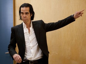 FILE - In this Feb. 18, 2013 file photo, Australian musician and screenwriter Nick Cave poses during a photo call promoting his new album 'Push the Sky Away' in Mexico City, Mexico. Cave said he is performing in Tel Aviv to take a stand against an international movement advocating for boycotts against Israel. Cave told reporters Sunday, Nov. 19, 2017, he came under pressure to cancel his shows by the BDS movement, which calls for boycotts, divestment and sanctions against Israel. (AP Photo/Eduardo Verdugo, File)