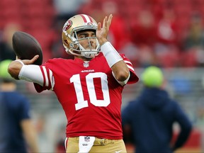 San Francisco 49ers quarterback Jimmy Garoppolo warms up before an NFL football game against the Seattle Seahawks Sunday, Nov. 26, 2017, in Santa Clara, Calif. (AP Photo/John Hefti)