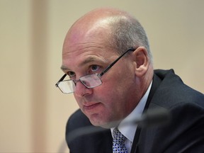 FILE - In this Feb. 8, 2016 file photo, President of the Senate Stephen Parry speaks during a Senate Estimates Committee at Parliament House in Canberra, Australia. Despite a High Court decision thought to have ruled a line under the saga last Friday, the dual citizenship crisis that has rocked Australia's parliament took another twist on Tuesday, Oct. 31 2017, with a senior member of the governing Liberal Party saying he may have to quit parliament. Senator Stephen Parry said he had contacted British authorities to see if he held dual nationality because of his UK-born father. (Lukas Coch/AAP Image via AP)
