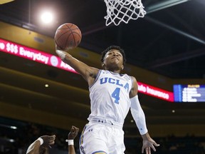 UCLA guard Jaylen Hands goes up for a dunk against South Carolina during the first half of an NCAA college basketball game Friday, Nov. 17, 2017, in Los Angeles. (AP Photo/Ringo H.W. Chiu)