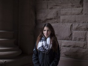 Ariana Chasse is photographed in Toronto on Wednesday, November 1, 2017, before joining fellow students in their protest against the ongoing strike by Ontario college faculty members. Chasse, a second-year fine arts student at St. Lawrence College in her hometown of Brockville, Ont., who found herself struggling with the overwhelming pressures of school, involvement in student government and family obligations. THE CANADIAN PRESS/Chris Young