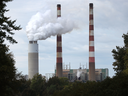 Emissions spew out of a large stack at the coal-fired Morgantown Generating Station in Newburg, Maryland. 