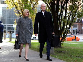 Laura Miller, former deputy chief of staff to ex-Ontario premier Dalton McGuinty, arrives at court in Toronto with her lawyer Scott Hutchison on Tuesday, Nov. 7, 2017. Miller and her boss, David Livingston, have pleaded not guilty to charges of illegally destroying documents related to the Liberal government???s controversial 2011 gas plants cancellations. THE CANADIAN PRESS/Colin Perkel