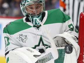 Dallas Stars goalie Ben Bishop reacts as he makes a stick save of a shot against the Colorado Avalanche in the first period of an NHL hockey game Wednesday, Nov. 22, 2017, in Denver. (AP Photo/David Zalubowski)