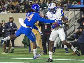 Colorado State receiver Michael Gallup pulls in a pass for a touchdown as Boise State cornerback Tyler Horton defends during the first quarter of an NCAA college football game Saturday, Nov. 11, 2017, in Fort Collins, Colo. (Timothy Hurst/The Coloradoan via AP)