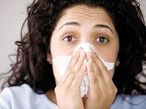 Workers with the flu or a cold should use sick days far more often than they do, doctors say.