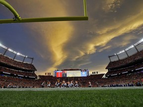 The Denver Broncos and the Cincinnati Bengals compete at dusk during the second half of an NFL football game, Sunday, Nov. 19, 2017, in Denver. (AP Photo/Jack Dempsey)
