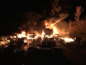 Ontario Provincial police say a fatal 14-vehicle pileup north of Toronto has caused a massive fire and closed a stretch of highway in both directions near Barrie, Ontario on Tuesday Oct. 31, 2017. OPP Sgt. Kerry Schmidt says that two fuel tanker trucks and at least three transport trucks were involved in the fiery crash, which happened in the northbound lanes south of Barrie, Ontario. THE CANADIAN PRESS/HO-Ontario Provincial Police-Sergeant Kerry Schmidt