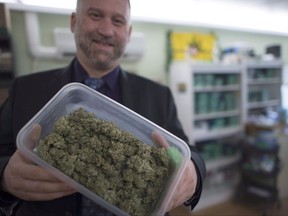 Dana Larsen is pictured at The Dispensary in Vancouver, Wednesday, Feb. 5, 2015. Cannabis activists say that while they've succeeded in helping to push for marijuana legalization across the country, their work is far from over. THE CANADIAN PRESS/Jonathan Hayward