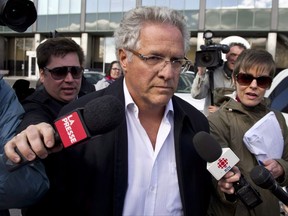 Quebec construction magnate Tony Accurso leaves the Quebec Provincial Police headquarters after being arrested for charges of fraud along with 13 others Tuesday, April 17, 2012 in Montreal. The fraud and corruption trial of well-known Quebec construction boss Tony Accurso has ended in a mistrial. THE CANADIAN PRESS/Paul Chiasson