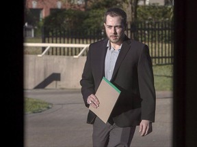 Christopher Calvin Garnier, charged with second-degree murder in the death of Truro police officer Const. Catherine Campbell, arrives at Nova Supreme Court in Halifax on Tuesday, Nov. 21, 2017. The Canadian Press/Andrew Vaughan