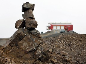 Canada's high arctic research station is being given at least a two-year reprieve as the federal government steps up with new funding. A rock cairn marks a high point near the Polar Environmental Atmospheric Research Laboratory (PEARL) near the Eureka Weather Station, on Ellesmere Island, Nunavut, on Monday, July 24, 2006. THE CANADIAN PRESS/Jeff McIntosh