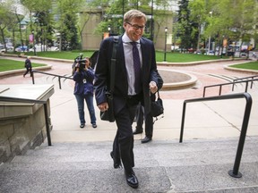 Alberta Minister of Education David Eggen arrives for a cabinet meeting in Calgary, Alta., Thursday, May 28, 2015. THE CANADIAN PRESS/Jeff McIntosh