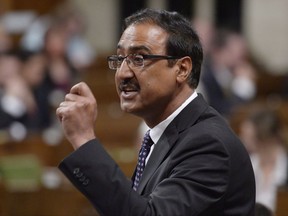 Minister of Infrastructure and Communities Amarjeet Sohi responds to a question during question period in the House of Commons on Parliament Hill in Ottawa on Thursday, June 15, 2017. The federal government is putting in place the 10 people who will guide a new agency designed to help finance new highways and transit systems around the country. THE CANADIAN PRESS/Adrian Wyld