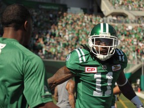 Saskatchewan Roughriders defensive back Ed Gainey celebrates an interception during first half CFL action against the Winnipeg Blue Bombers, in Regina on Sunday, September 3, 2017. Returning to the CFL playoffs for the first time since 2014 has been a slow, uphill climb for the Saskatchewan Roughriders. THE CANADIAN PRESS/Mark Taylor