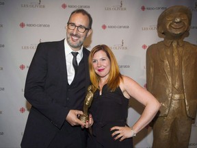 Martin Petit and Marie-Christine Lachance hold up their trophy for best stage direction at the Gala Olivier awards ceremony in Montreal on May 10, 2015. The recent sex-assault controversy involving the founder of the Just For Laughs festival has prompted the creation of a new comedy bash. The new comedy fest is the creation of standup comedian Martin Petit and is expected to be launched in 2018. THE CANADIAN PRESS/Graham Hughes