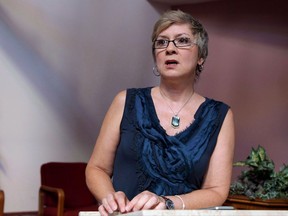 Rev. Gretta Vosper is seen at her West Hill United Church in Toronto on Wednesday, Aug. 5, 2015. An unprecedented ecclesiastical court hearing that could see the United Church defrock a self-professed atheist minister who does not believe in the Bible has been postponed indefinitely. THE CANADIAN PRESS/Colin Perkel