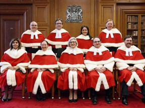 The Supreme Court Justices pose for a group photo during the official welcoming ceremony for Justice Malcolm Rowe, in Ottawa, Friday, December 2, 2016. Top row, left to right, Justice Russell Brown, Justice Clement Gascon, Justice Suzanne Cote, and Justice Malcolm Rowe. Bottom row, left to right, Justice Andromache Karakatsanis, Justice Rosalie Abella, Chief Justice Beverley McLachlin, Justice Michael Moldaver, Justice Richard Wagner. Prime Minister Justin Trudeau has made his second appointment to the Supreme Court of Canada, naming Sheilah Martin to fill the vacancy that will open when Chief Justice Beverley McLachlin retires next month. THE CANADIAN PRESS/Fred Chartrand