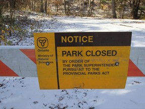 A sign posted at the Pinery Provincial Park is seen near Grand Bend, Ont. on Friday, Nov. 10, 2017. Ontario's Ministry of Natural Resources and Forestry says talks continue in an effort to resolve an issue that led to the closure of a provincial park nearly two weeks ago.THE CANADIAN PRESS/Dave Chidley