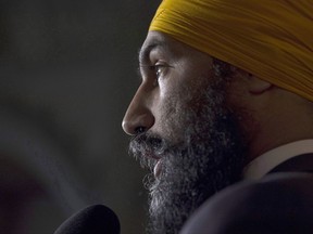 NDP leader Jagmeet Singh speaks with the media following caucus on Parliament Hill in Ottawa on October 25, 2017. NDP Leader Jagmeet Singh is urging Prime Minister Justin Trudeau to decriminalize all drugs to help combat the opioid crisis in Canada. Singh, who campaigned on this pledge during his party's recent leadership race, says he now plans to push for the NDP to adopt this as formal party policy. THE CANADIAN PRESS/Adrian Wyld