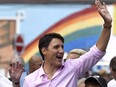 Prime Minister Justin Trudeau marches in the Ottawa Capital Pride parade, Sunday, Aug. 27, 2017.