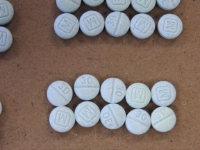 Fentanyl pills are shown in an undated file photo. Canada's anti-money laundering agency is helping fight the scourge of fentanyl by tracing the illicit movement of funds tied to the deadly drug.THE CANADIAN PRESS/ AP-Cuyahoga County Medical Examiner's Office via AP