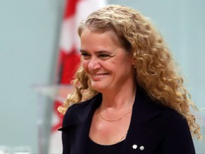Governor General Julie Payette takes part in her first official ceremony as she presents Awards in Commemoration of the Persons Case, at Rideau Hall, the official residence of the Governor General of Canada, in Ottawa on October 19, 2017. The Parliament Hill hoopla this week was all about horoscopes and Halloween costumes, with an undertone of Bill Morneau controversy for good measure. The new governor general, former astronaut Julie Payette, made a notable debut on the federal scene on Wednesday with a speech to fellow scientists. Her mocking of climate-change deniers, creationists, homeopathic medicine and horoscope-believers prompted howls of protest from those who say a representative of the Queen should be seen, not heard -- at least when it comes to opinions. THE CANADIAN PRESS/Fred Chartrand