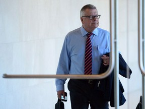 Public Safety Minister Ralph Goodale arrives to appear at commons committee a briefing on the issue of asylum seekers irregularly entering Canada from the United States in Ottawa on Thursday, Oct. 5, 2017. THE CANADIAN PRESS/Sean Kilpatrick