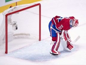 Montreal Canadiens goalie Carey Price (31) reacts after letting in the third goal during second period NHL hockey action against the Los Angeles Kings in Montreal on October 26, 2017. The lower body injury suffered by goaltender Carey Price last week is not related to a knee injury that caused him to miss most of the 2015-16 season, Montreal Canadiens coach Claude Julien said Tuesday. Price did not practice with the team but is expected to be back on skates later this week, the coach said. THE CANADIAN PRESS/Ryan Remiorz