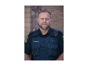 Const. Denton Michelson is seen in an undated police handout image. Michelson rescued two women who went into the Oldman River in Lethbridge to try to get their dogs to stop attacking a deer. THE CANADIAN PRESS/HO-Lethbridge Police Services, *MANDATORY CREDIT*