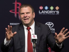 Houston Rockets owner Tilman Fertitta answers a question during an introductory news conference, Tuesday, Oct. 10, 2017, in Houston. The owner of the NBA's Rockets has expressed interest in bringing an NHL franchise to Houston, but is proceeding cautiously. THE CANADIAN PRESS/AP-Brett Coomer/Houston Chronicle via AP