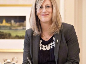 Service Alberta Minister Stephanie McLean is sworn in as a new cabinet minister in Edmonton in a February 2, 2016 file photo. Alberta is bringing in new rules to protect consumers if they get shut out by bots when trying to buy concert or show tickets online.THE CANADIAN PRESS/Jason Franson