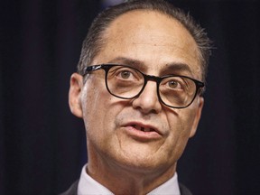 Alberta is beefing up and harmonizing codes of conduct for those who work at its 136 core agencies. Alberta Finance Minister Joe Ceci speaks about the Government of Alberta's 2016-17 year-end financial results, in Edmonton on Thursday, June 29, 2017. THE CANADIAN PRESS/Jason Franson
