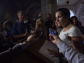 Foreign Affairs Minister Chrystia Freeland updates the media on the NAFTA negotiations in the foyer outside the House of Commons on Parliament Hill in Ottawa on Monday, Sept. 25, 2017. THE CANADIAN PRESS/Sean Kilpatrick