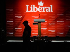 A camera operator waits for the start of Liberal leader Justin Trudeau's event in Montreal on October 19, 2015. As Liberal MPs spend this week in their ridings, they are tasked with reminding Canadians what they have done since the last election as they start boosting their efforts to convince voters they deserve to stay. THE CANADIAN PRESS/Justin Tang