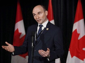 Social Development Minister Jean-Yves Duclos speaks to reporters at a Liberal cabinet retreat in Calgary on January 24, 2017. The Trudeau government is facing calls to produce its long-awaited plan to help homeless veterans in Canada, after their plight received only a passing mention in the Liberals' new housing strategy. The government has been working for more than a year on a plan to support homeless veterans and those at risk of losing becoming homeless, who advocates say need and deserve extra attention after serving in uniform. Social Development Minister Jean-Yves Duclos told The Canadian Press that Veterans Affairs Canada is continuing to work on measures to help veterans in need, but didn't offer any additional details. THE CANADIAN PRESS/Todd Korol