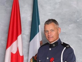 Cst. John Davidson is shown in this undated handout photo. Warren Banks was driving home on Halloween wearing his costume -- a brown cultist robe -- when he was pulled over by a police officer in Abbotsford B.C. It led to an encounter Banks remembers for how kind the officer was, made even more poignant this week when he learned the policeman, Const. John Davidson, had lost his life in the line of duty. "It was just a really pleasant, friendly interaction and we got to the end and I just thought this guy is really exemplary," Banks said. Davidson, who was 53, was killed Monday while responding to a suspected stolen vehicle call when shots were fired. THE CANADIAN PRESS/HO - Abbotsford Police Department