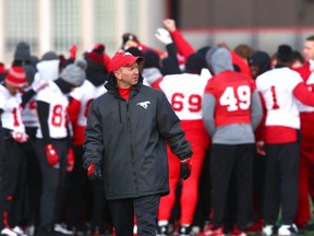 Calgary Stampeders head coach Dave Dickenson looks on during practice before the West Division final on Nov. 18.