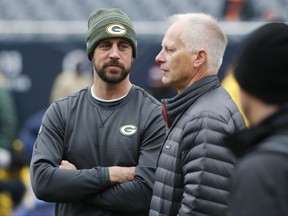 Green Bay Packers' Aaron Rodgers, talk to ESPN's Kenny Mayne before an NFL football game against the Chicago Bears, Sunday, Nov. 12, 2017, in Chicago. (AP Photo/Charles Rex Arbogast)